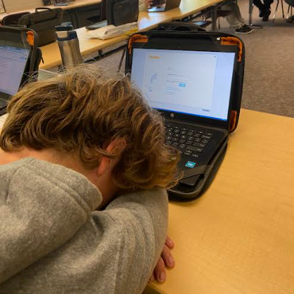 Freshman Landen Collins sits at his computer, stressed from NWEA.