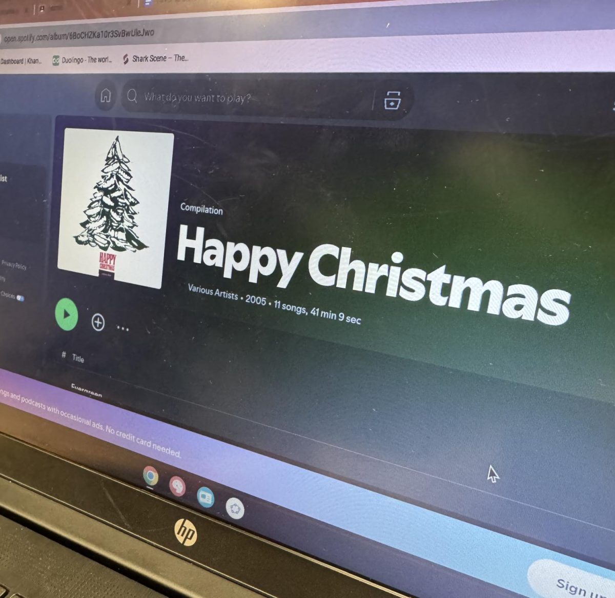 A student displays their Christmas playlist on Spotify.