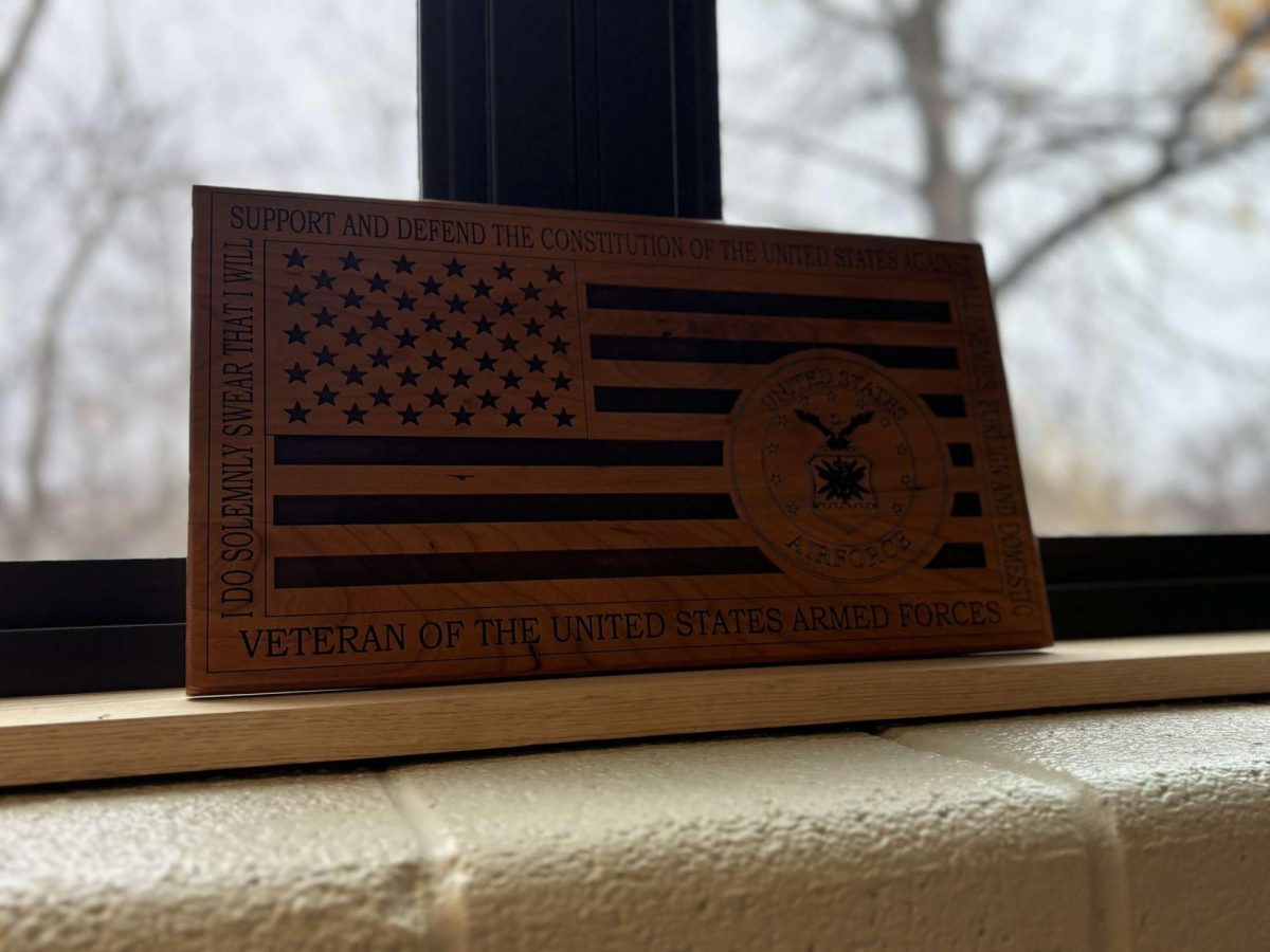 One of the plaques made by the Woodshop class!