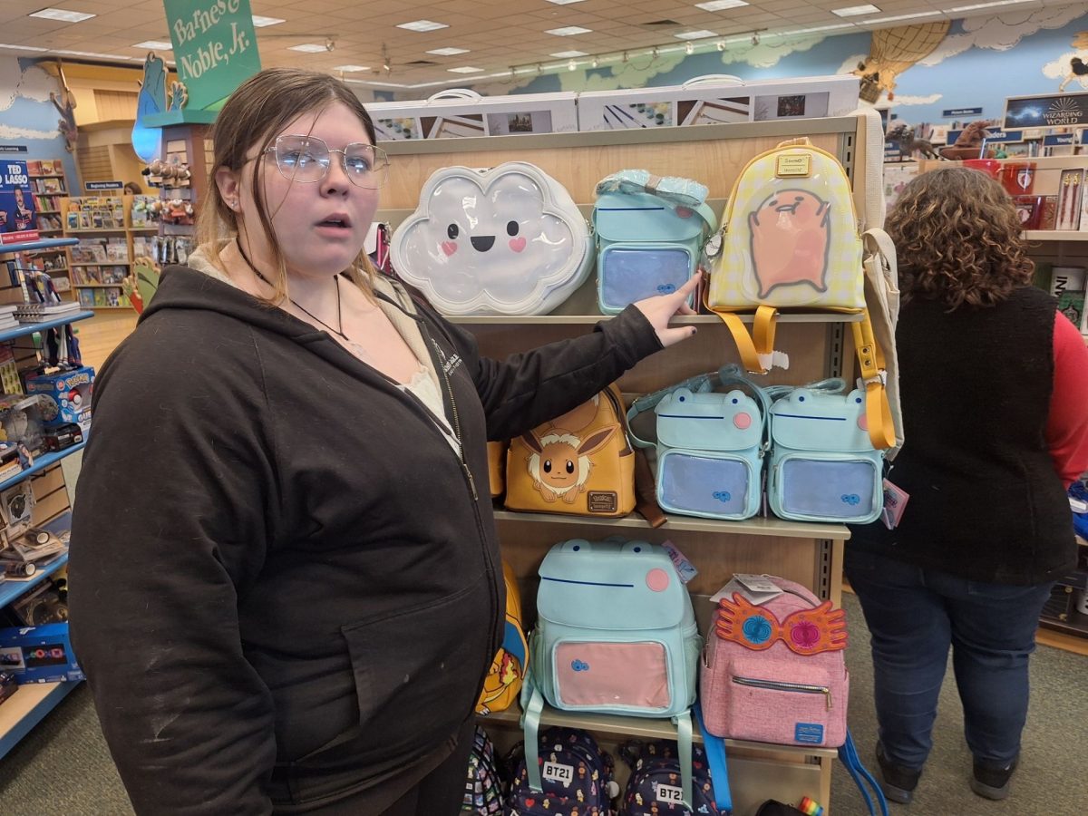 Junior Leia Firman shops in-person at Barnes and Noble.