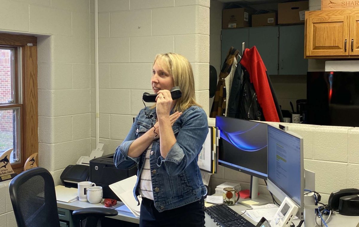 Joy March recites the pledge of allegiance during the morning announcements.