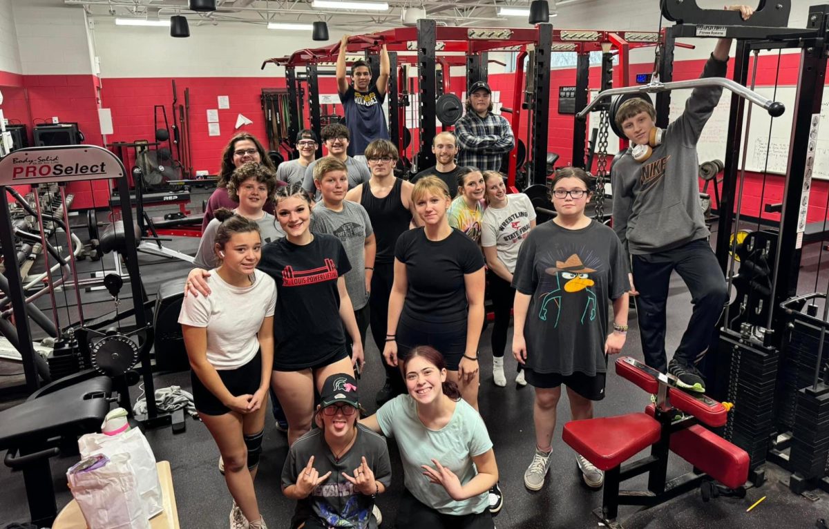 Members of the Powerlifting Team take a photo to celebrate the beginning of this sports season.