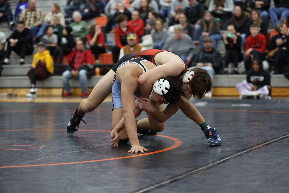 Drew Challender wrestles his opponent in the finals.