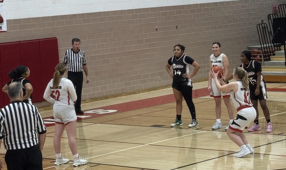 Courtney VanAlstine concentrates as she prepares to shoot a free throw.