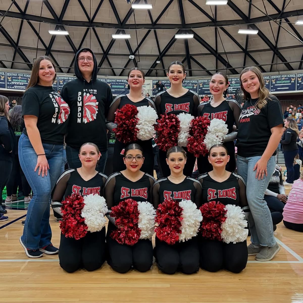 Varsity Poms team grouped together in a photo!