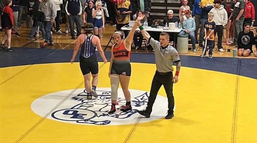 Senior Tekoha Henry stands in victory after her match.