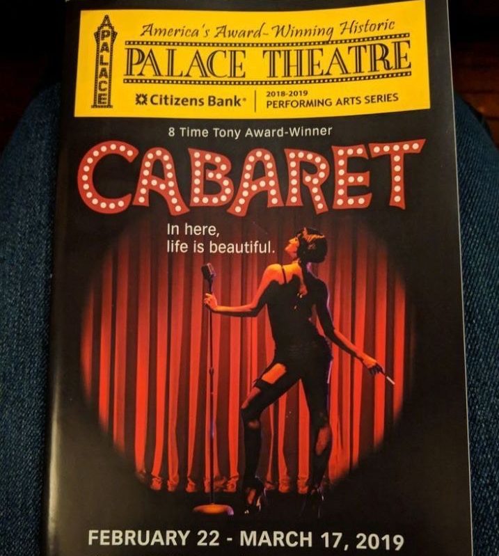 A student's playbill from Cabaret sits on display.