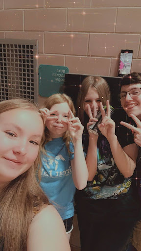 Students Korbyn, Cora, Aiden, and Aleigha poses together in a photo.