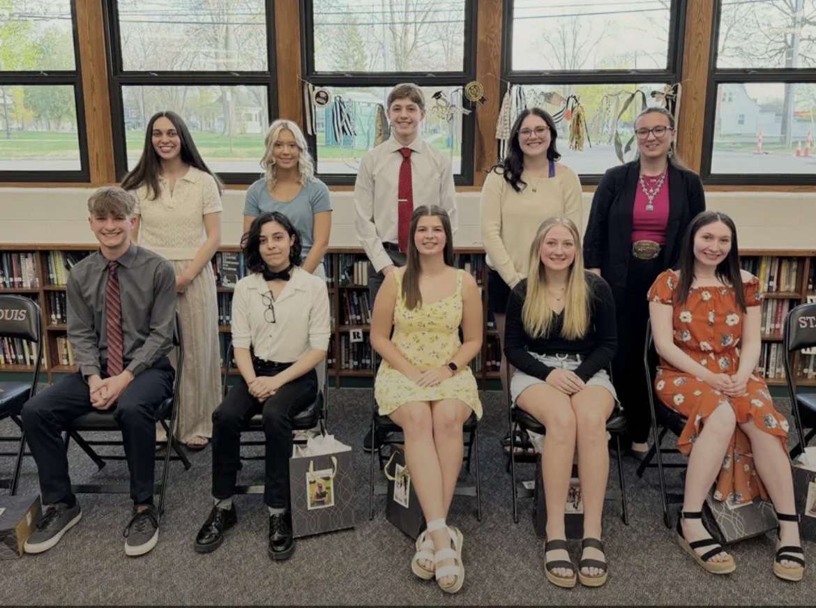 The top 10 graduates of the class of 2025 take a photo together at the event.