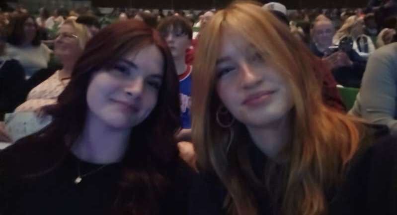 Sophomores Bella Patterson and Hudsyn Humble take a selfie before the concert begins.