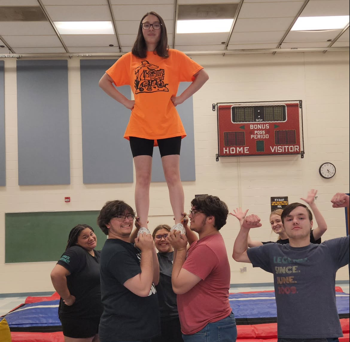 The cheer team practicing for the upcoming season.