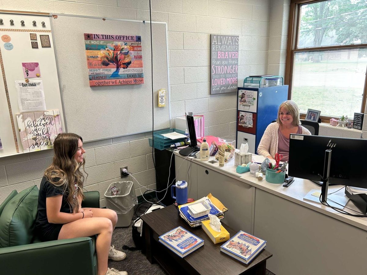 Junior Halle Hoyt discusses her classes for her senior year with Mrs. Sura.