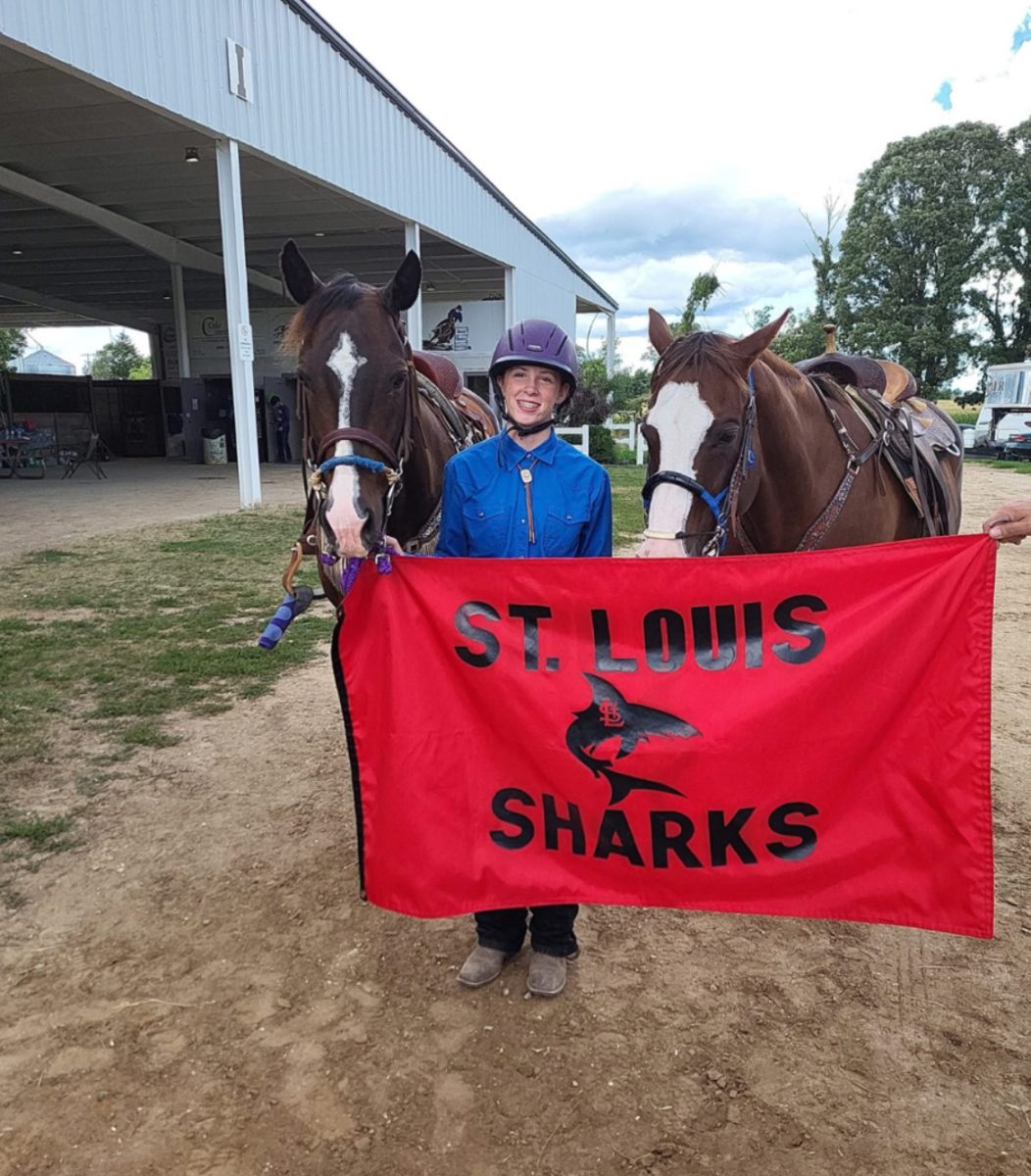 Sarah Bowerman poses next to her horse after the competition!