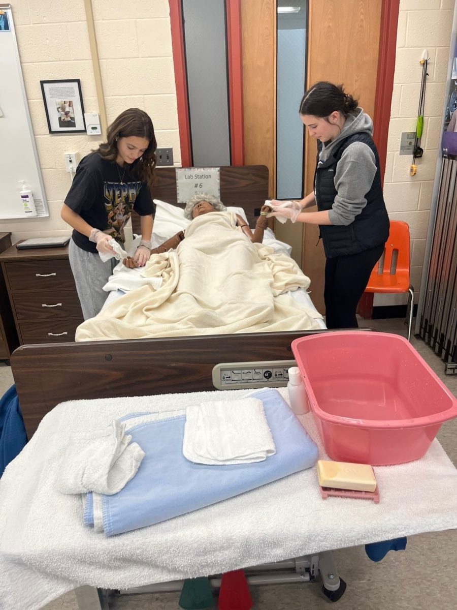 Two Vocational students practice their nursing skills!