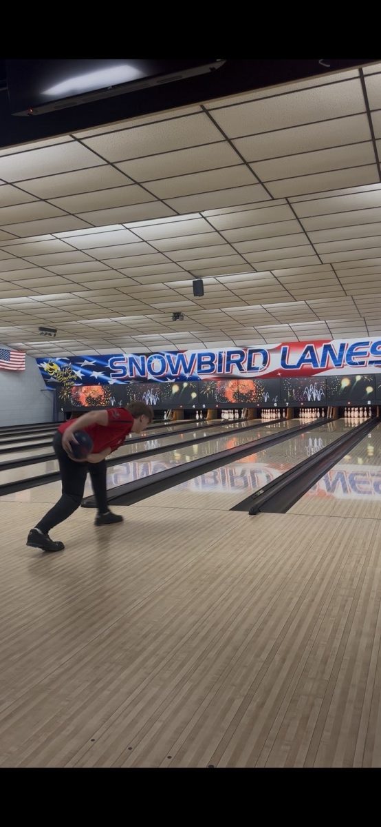 Merick Bartlett practices his bowling technique!