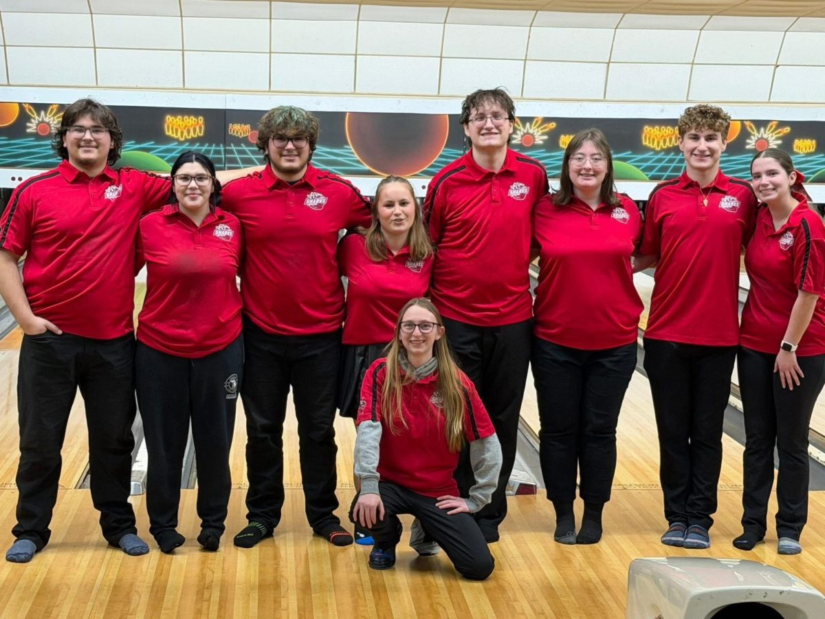Senior Bowlers and Coach Mitchell pose for a photo!